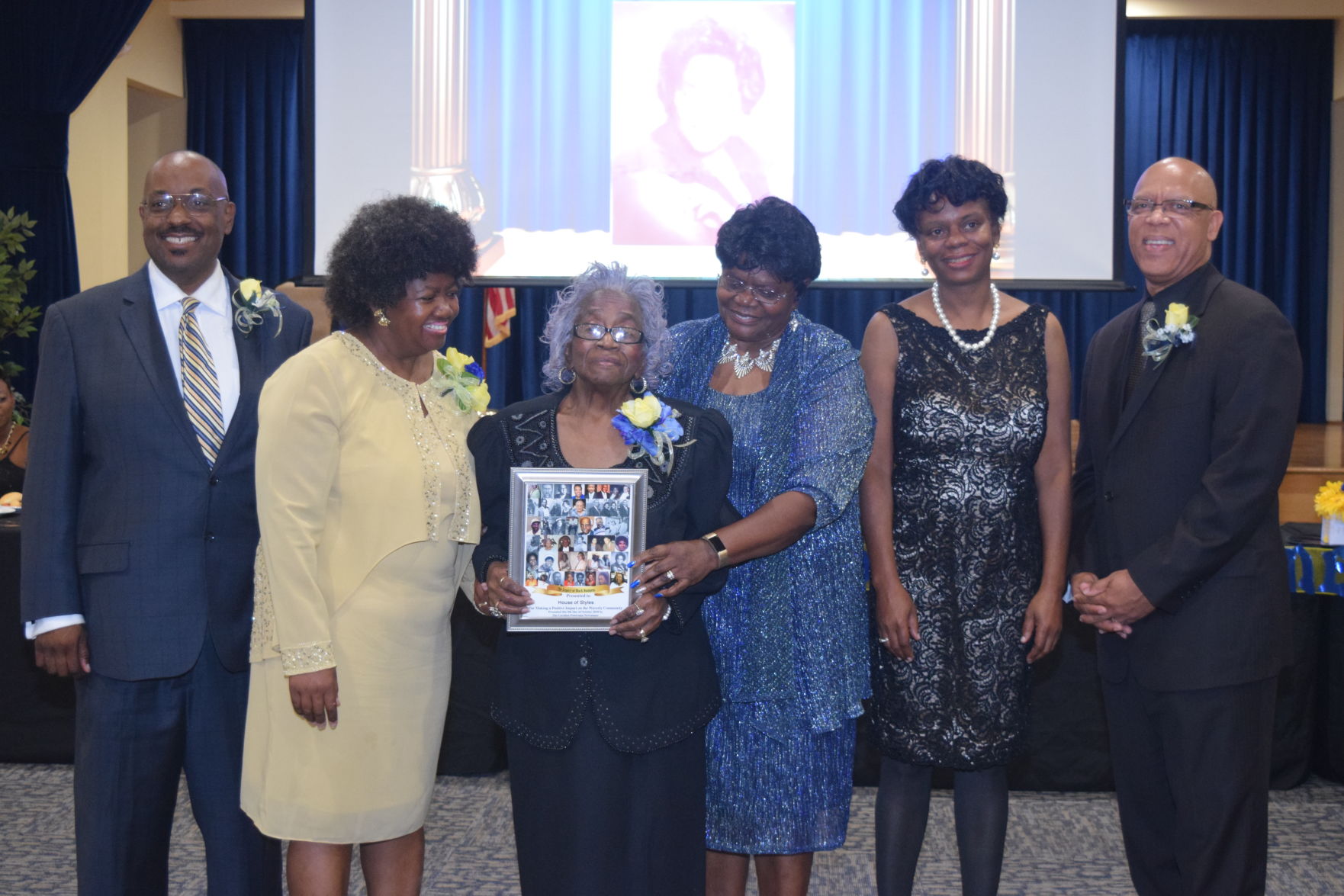 Dolores Kelly accompanied by Vivian Crandall Receives Legacy Award for her business Kelly House of Styles.
